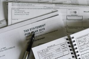 Tax Statement - olga-delawrence-5616whx5NdQ-unsplash
